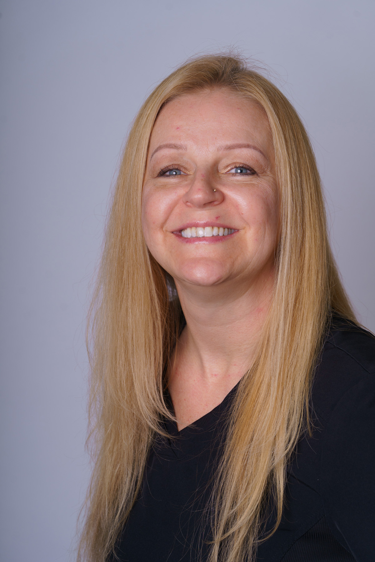 A headshot of Fran, a dental hygienist at Walton Family Dental