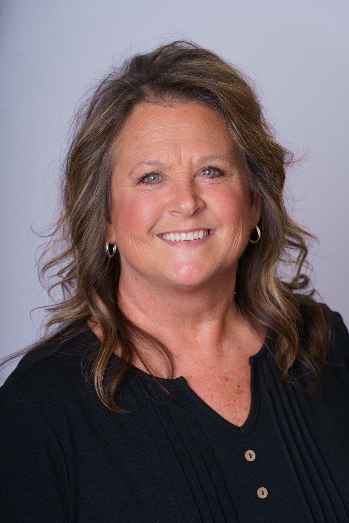 A headshot of Tamara, a scheduling coordinator at Walton Family Dental